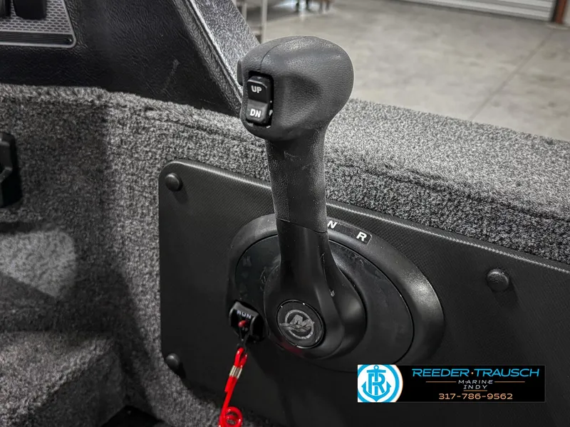 Slide: The Image of 2025 Lund 1775 IMPACT XS SINGLE boat throttle control with up and down buttons. - 40
