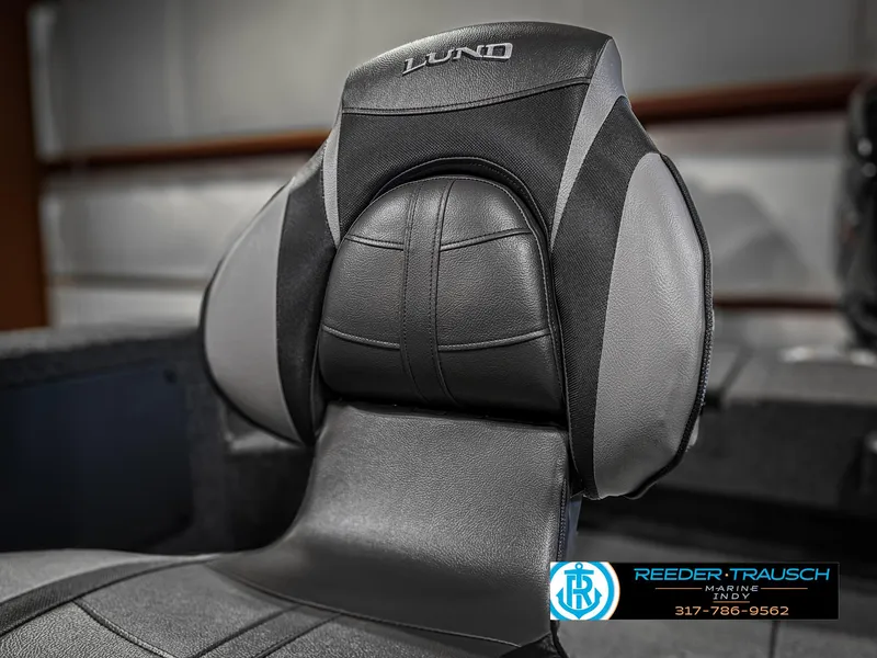 Slide: The Image of 2025 Lund 1775 IMPACT XS boat seat, black and gray design, Reeder-Trausch Marine logo. - 42