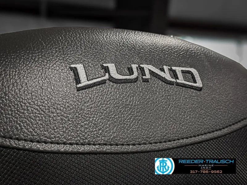 Slide: The Image of 2025 Lund 1775 Impact XS Single boat seat with logo detail. - 43