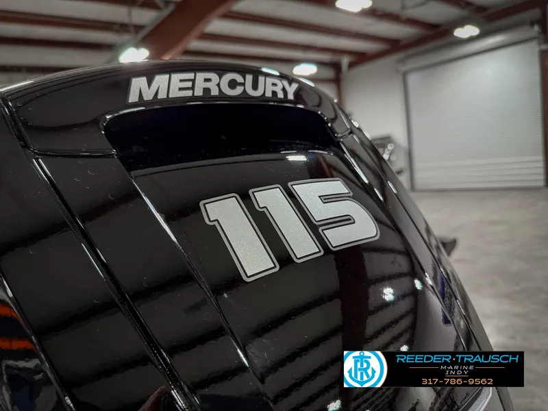 Slide: The Image of 2025 Lund 1775 Impact XS with Mercury 115 engine in a showroom. - 49