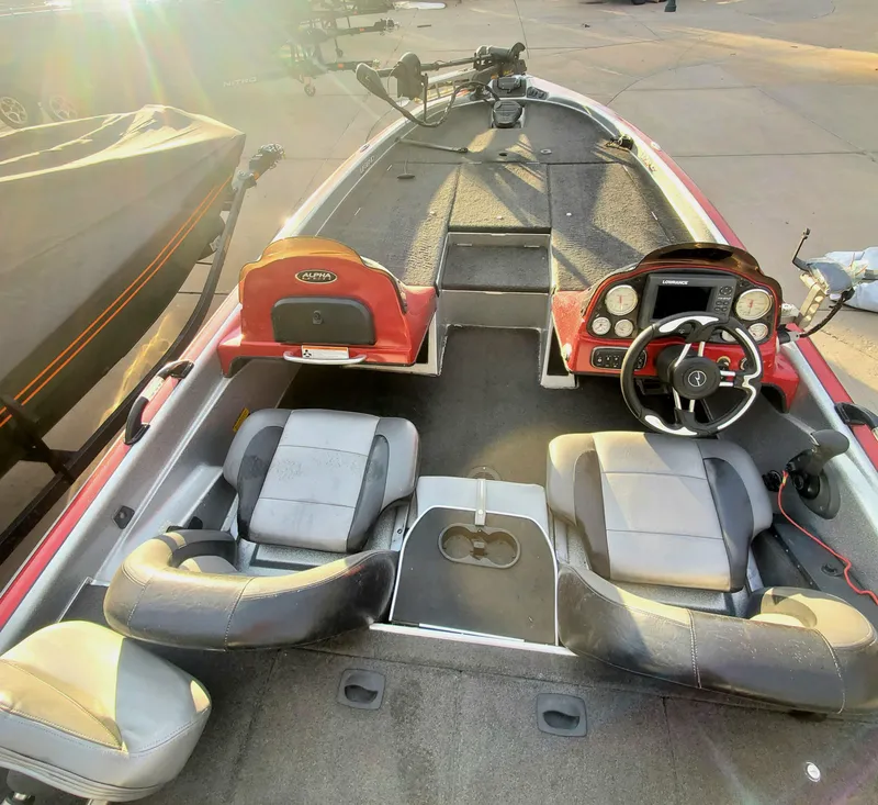 Slide: The Image of 2007 Legend Alpha 199 boat interior with steering wheel and seating. - 3