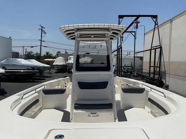 Slide: The Image of 2025 Bayliner Trophy T24CC boat with spacious deck and modern design. - 7