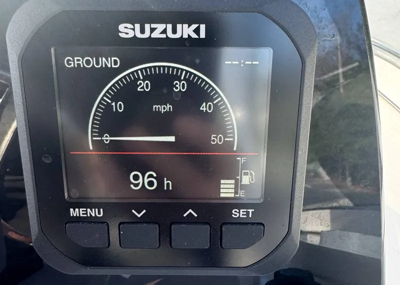 Slide: The Image of Suzuki boat dashboard display showing speedometer and 96 hours usage on Sea Pro 240 DC, 2023. - 20