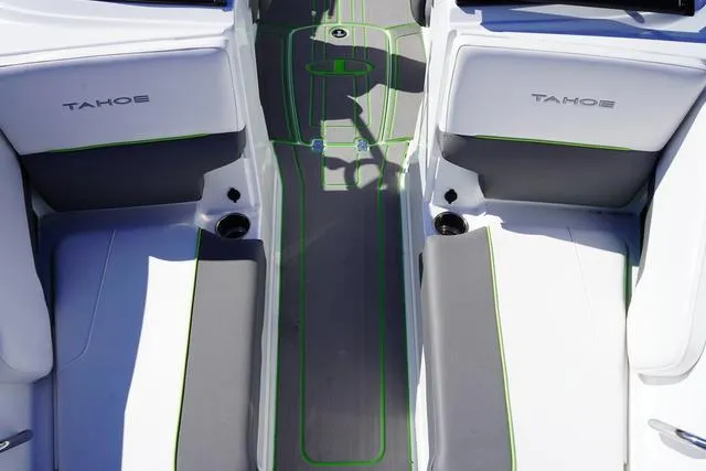 Slide: The Image of 2024 Tahoe 210 S boat interior with gray and green accents, featuring comfortable seating. - 14