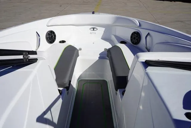 Slide: The Image of 2024 Tahoe 210 S boat interior with seating and speakers. - 15