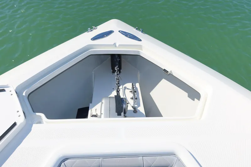 Slide: The Image of Bow of 2020 SeaVee 370z boat with anchor storage, on calm water. - 12
