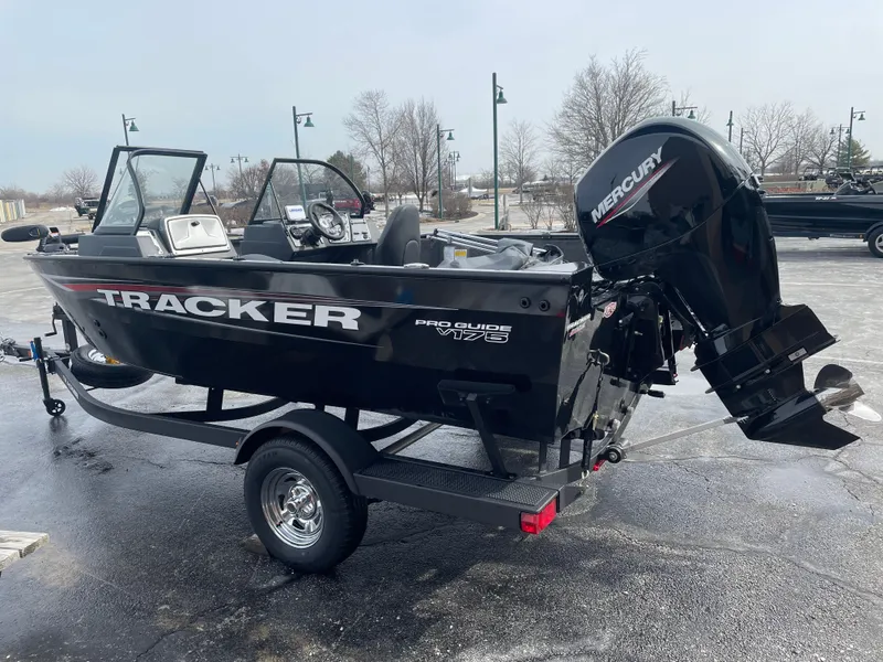 Slide: The Image of 2025 Tracker Pro Guide V-175 Combo boat with Mercury engine on trailer. - 2