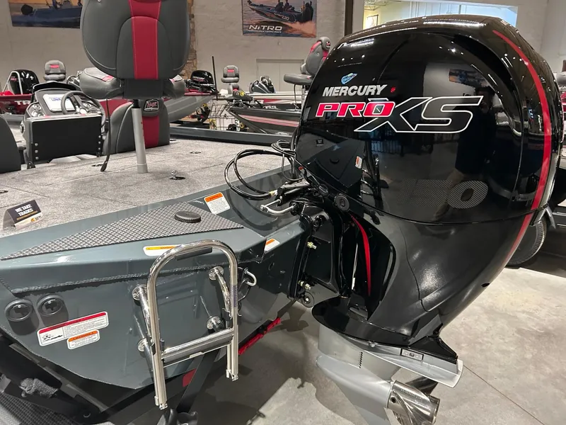 Slide: The Image of 2025 Ranger RT198P boat with Mercury Pro XS engine in showroom. - 3