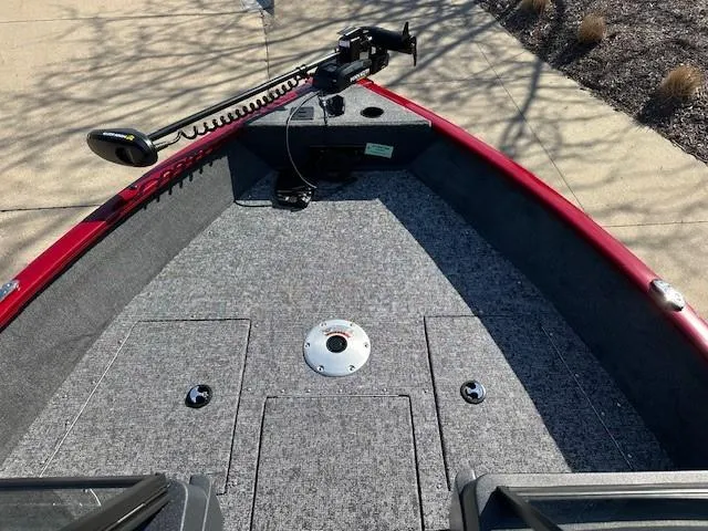 Slide: The Image of 2025 Tracker Pro Guide V-175 WT boat deck with trolling motor and storage compartments. - 3