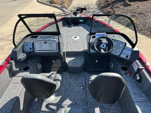 Slide: The Image of 2025 Tracker Pro Guide V-175 WT boat interior with dual consoles and seating. - 4