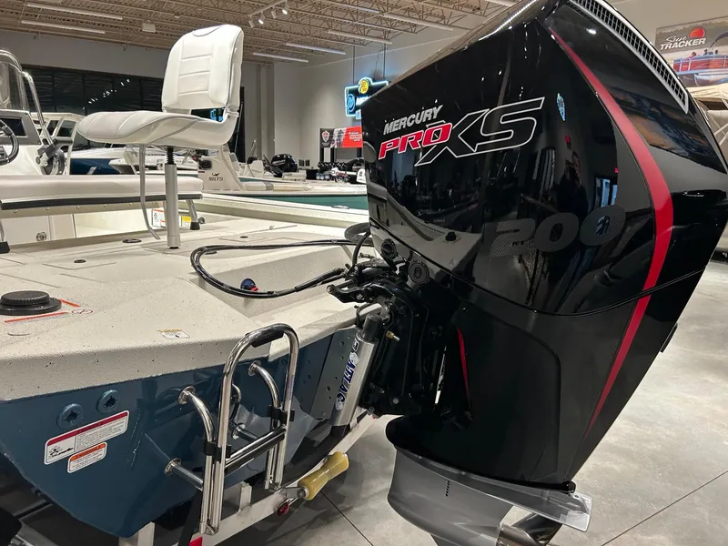 Slide: The Image of 2025 Ranger RB210 boat console with steering wheel and navigation system. - 3