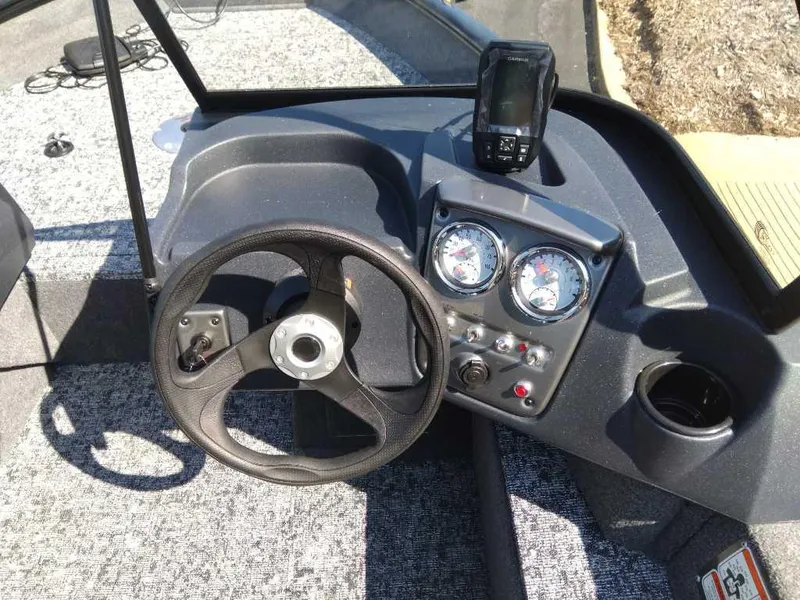 Slide: The Image of 2025 Tracker Pro Guide V-16 WT dashboard with steering wheel and gauges. - 4