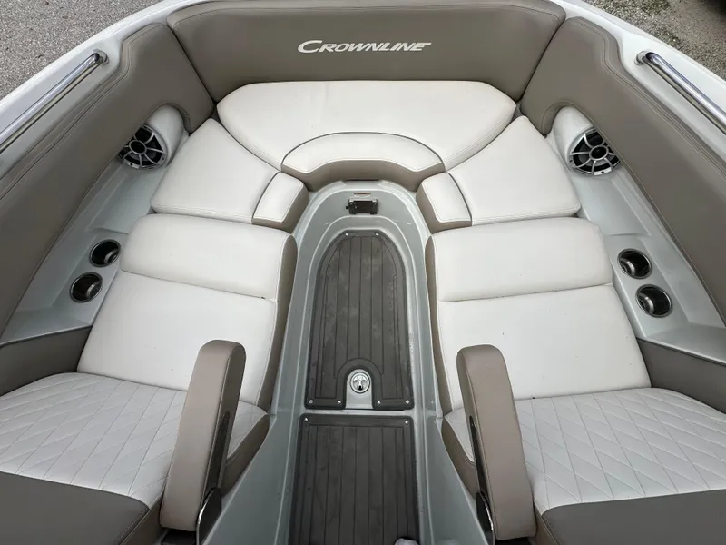 Slide: The Image of 2018 Crownline Eclipse E25 boat interior with cushioned seating and modern design. - 13