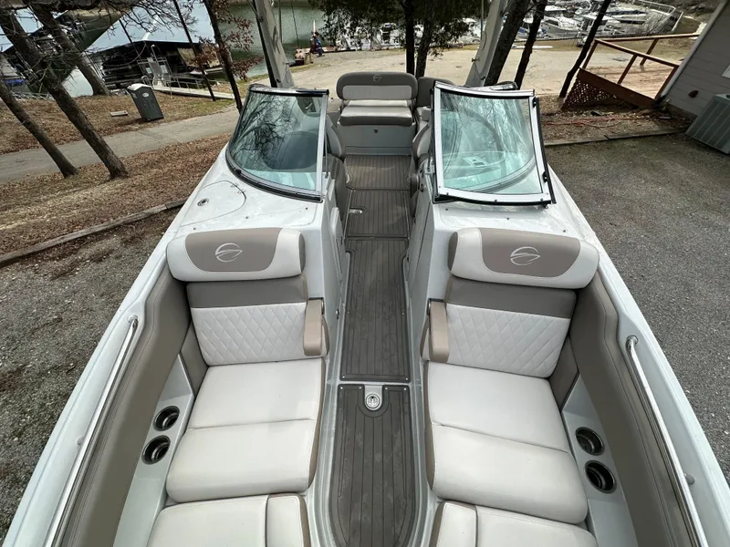 Slide: The Image of 2018 Crownline Eclipse E25 boat interior with spacious seating and elegant design. - 15