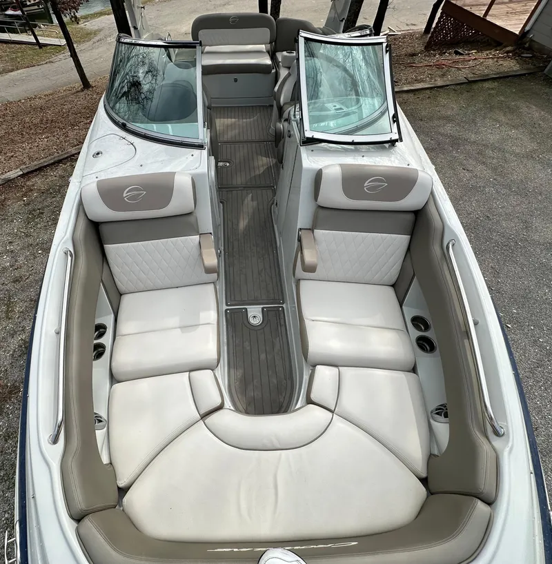 Slide: The Image of 2018 Crownline Eclipse E25 boat interior with spacious seating and elegant design. - 17