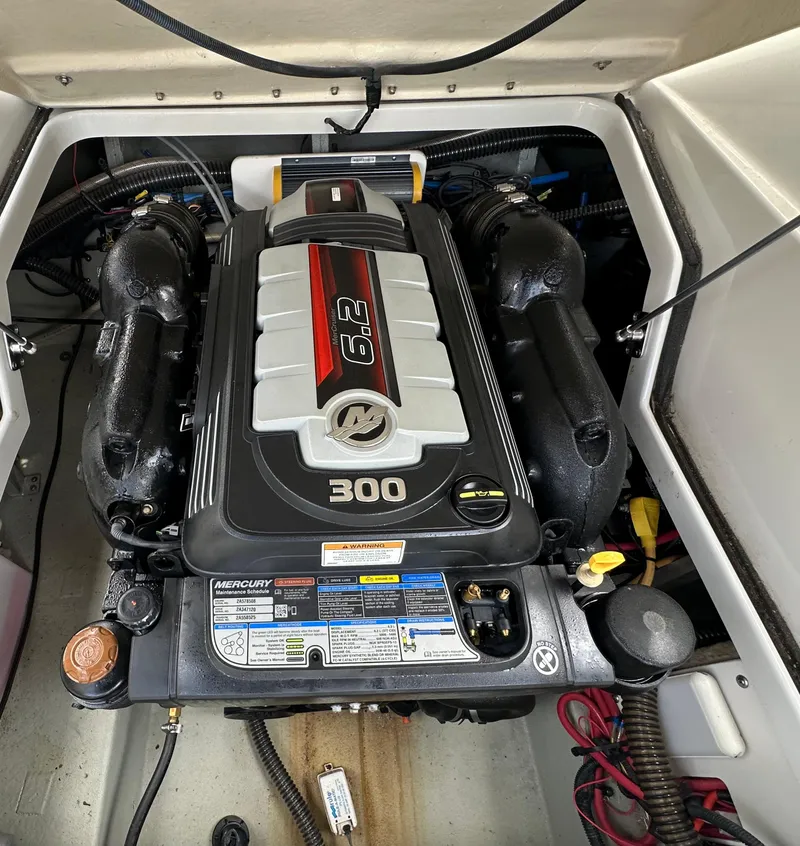 Slide: The Image of 2018 Crownline Eclipse E25 engine compartment with a 6.2L 300 HP engine. - 21