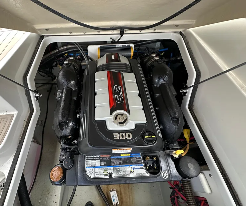 Slide: The Image of 2018 Crownline Eclipse E25 engine compartment with Mercury 6.2L 300 HP engine. - 22