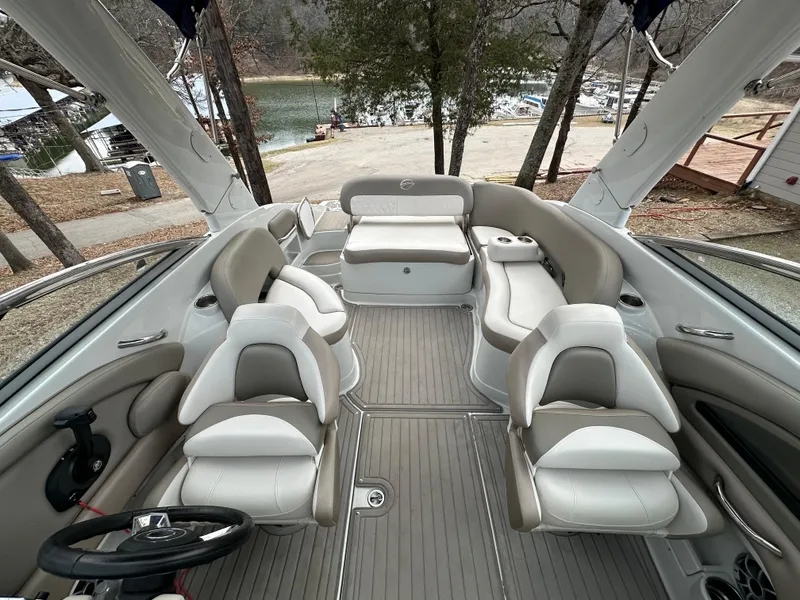 Slide: The Image of 2018 Crownline Eclipse E25 boat interior with spacious seating and elegant design. - 8