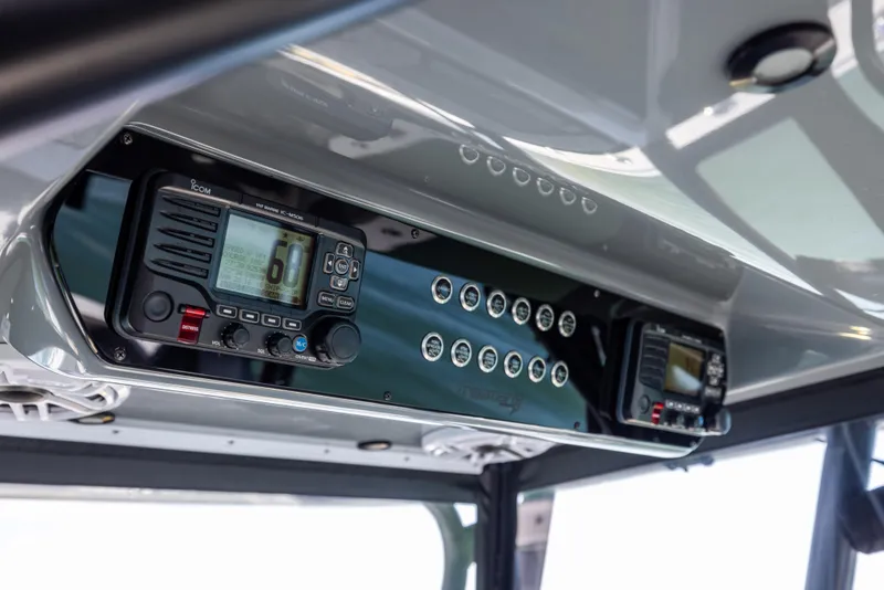 Slide: The Image of 2022 Freeman 37 VH boat dashboard with electronic controls and display panels. - 35