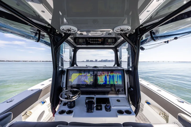 Slide: The Image of Interior view of 2022 Freeman 37 VH boat cockpit with advanced navigation displays. - 42