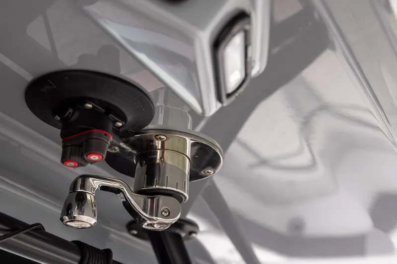 Slide: The Image of Close-up of a Freeman 37 VH 2022 boat component, featuring a metallic handle and switches. - 43