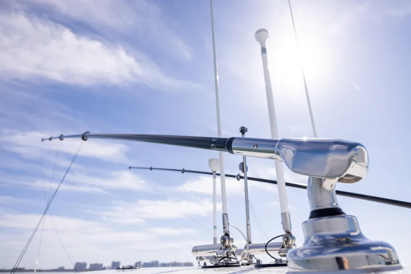 Slide: The Image of Freeman 37 VH 2022 boat antenna against a bright blue sky. - 44