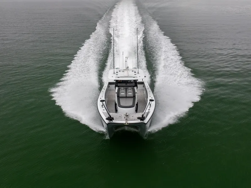 Slide: The Image of 2022 Freeman 37 VH boat cruising on open water, aerial view. - 8
