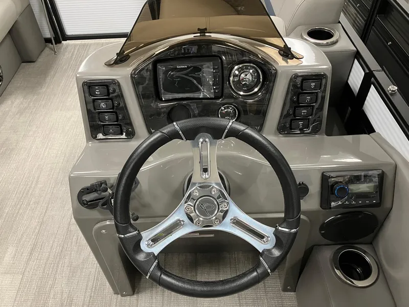 Slide: The Image of 2024 Qwest 816 XRE Cruise dashboard with steering wheel and control panel. - 11