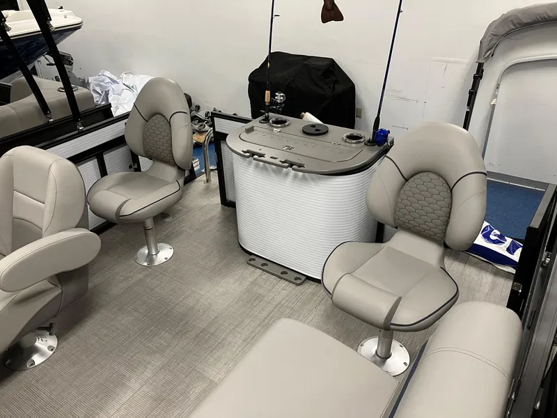 Slide: The Image of 2024 Qwest 816 XRE Cruise boat interior with plush seating and modern design. - 3