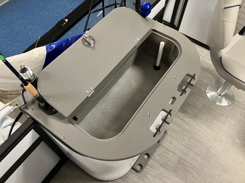 Slide: The Image of 2024 Qwest 816 XRE Cruise boat livewell with fishing rod holders and seating. - 6