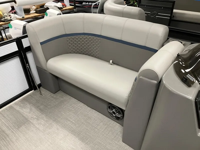 Slide: The Image of 2024 Qwest 816 XRE Cruise boat interior with gray cushioned seating and modern design. - 7