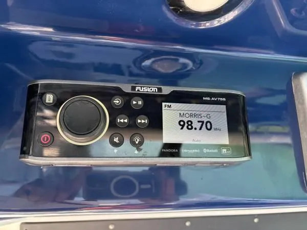 Slide: The Image of Fusion MS-AV755 marine stereo on 2012 Everglades 325 Center Console, tuned to 98.70 FM. - 12