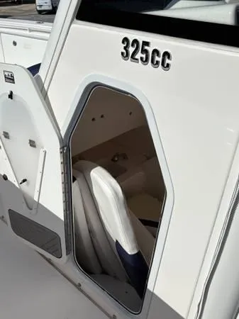 Slide: The Image of 2012 Everglades 325 Center Console boat interior view. - 14