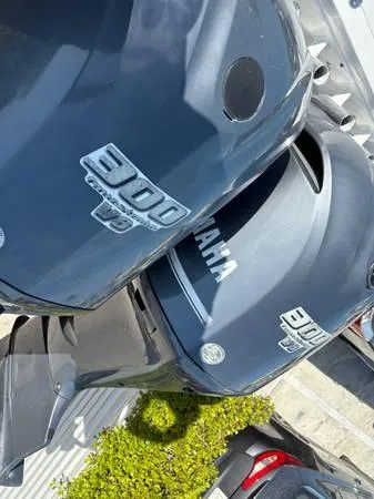 Slide: The Image of Yamaha 300 V6 outboard engines on a 2012 Everglades 325 Center Console boat. - 4