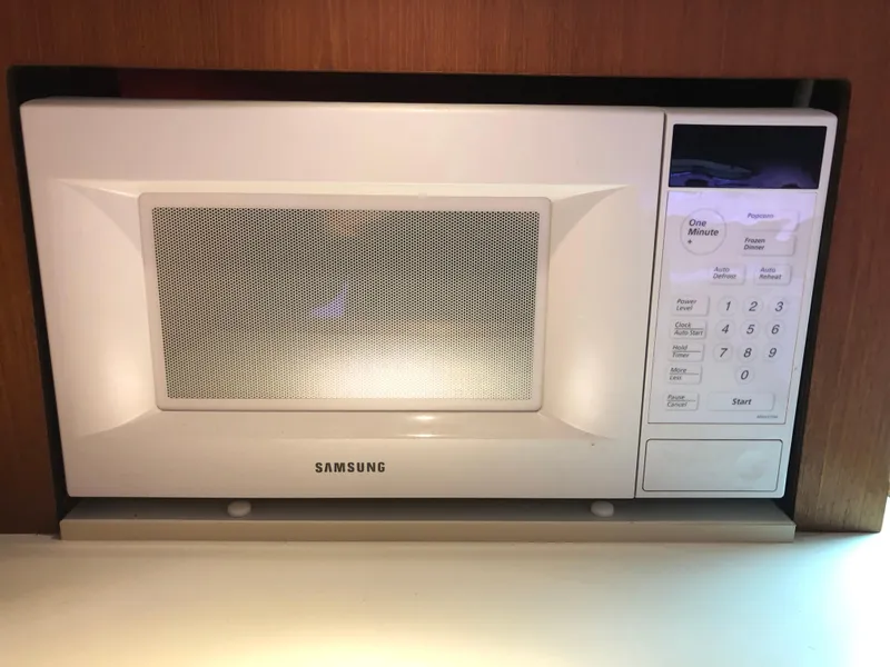 Slide: The Image of White Samsung microwave installed in a Tiara Yachts 3100 Open, 2000 model. - 25