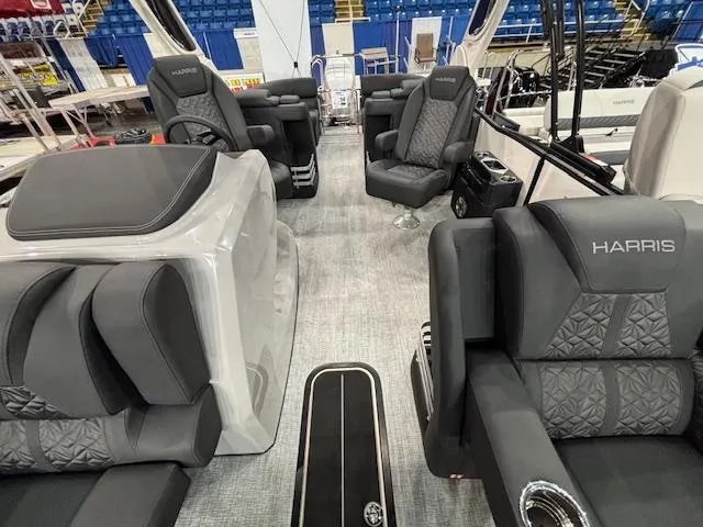 Slide: The Image of 2025 Harris Grand Mariner 250 interior with luxurious seating and modern design. - 11