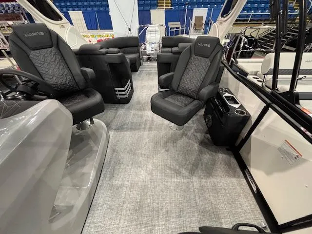 Slide: The Image of 2025 Harris Grand Mariner 250 interior with luxurious seating and modern design. - 12