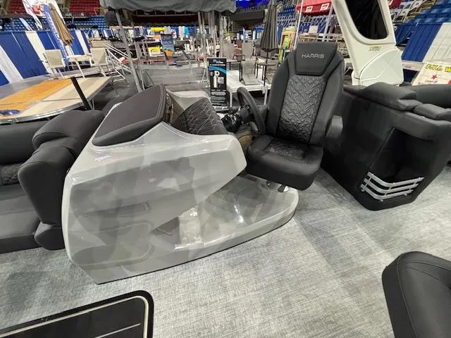 Slide: The Image of 2025 Harris Grand Mariner 250 boat interior with modern seating and sleek design. - 13
