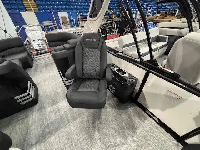 Slide: The Image of 2025 Harris Grand Mariner 250 boat interior with luxurious seating and modern design. - 14