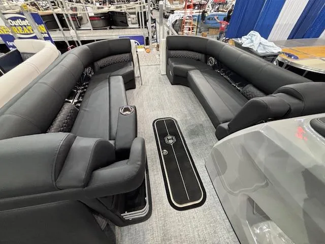 Slide: The Image of Luxurious seating on 2025 Harris Grand Mariner 250 pontoon boat, featuring sleek black upholstery. - 35