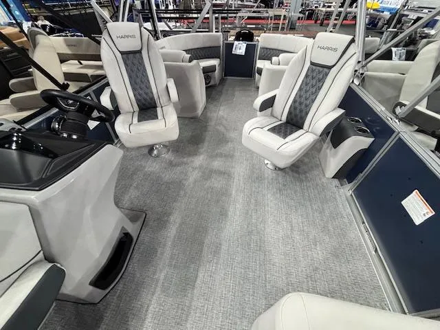 Slide: The Image of Interior of 2025 Harris Sunliner 230 CWDH pontoon boat with luxurious seating. - 18