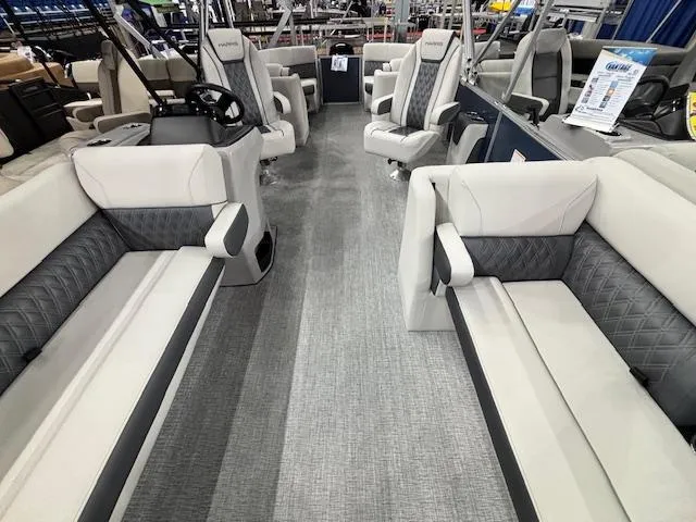 Slide: The Image of Interior of 2025 Harris Sunliner 230 CWDH pontoon boat with luxurious seating and modern design. - 19
