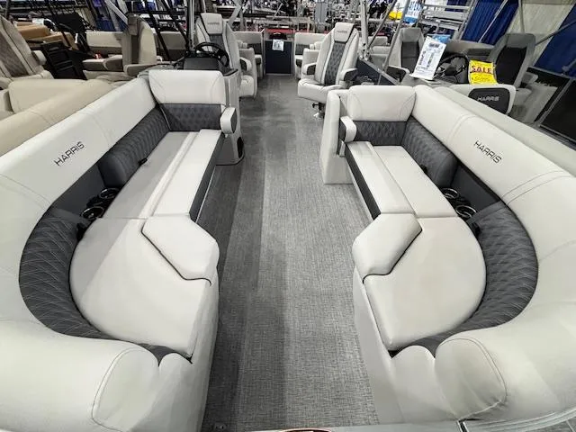Slide: The Image of 2025 Harris Sunliner 230 CWDH interior with luxurious seating and modern design. - 20