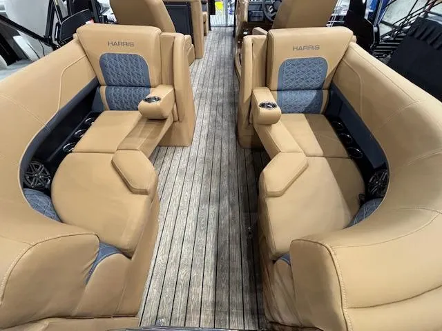 Slide: The Image of 2025 Harris Solstice 230 interior with tan leather seating and wood flooring. - 12