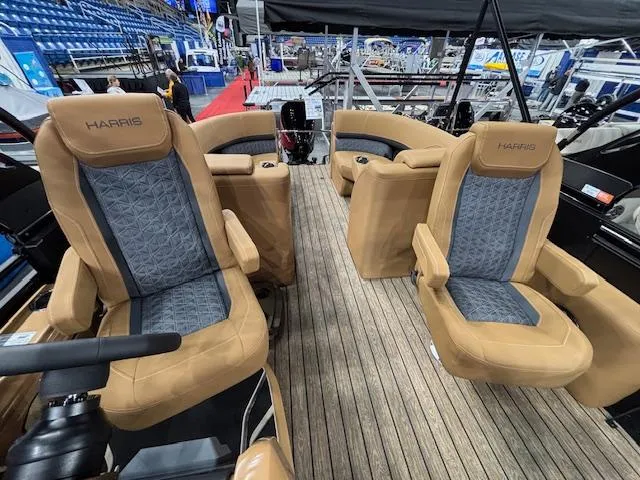 Slide: The Image of 2025 Harris Solstice 230 boat interior with luxurious seating and modern design. - 7