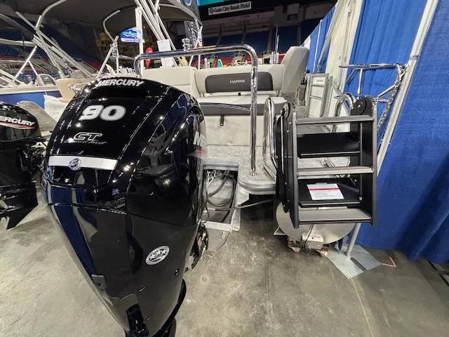 Slide: The Image of 2025 Harris Cruiser 210 SL with Mercury 90 CT engine at a boat show. - 15