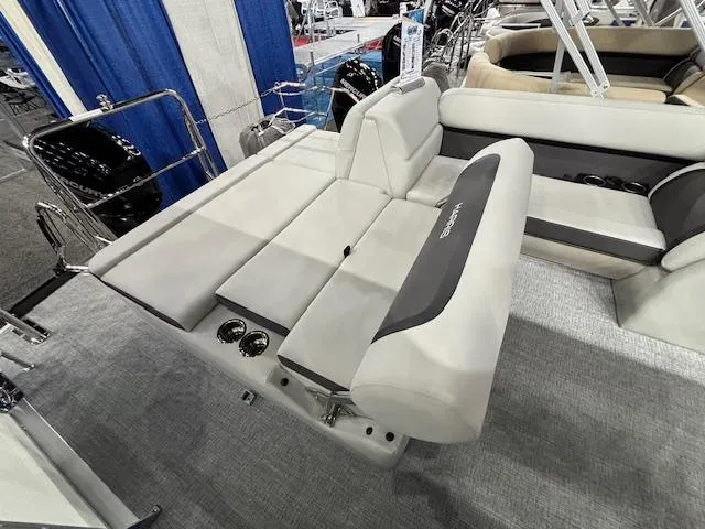 Slide: The Image of 2025 Harris Cruiser 210 SL boat interior with plush seating and modern design. - 18