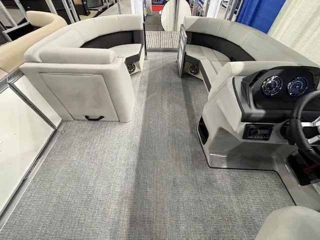 Slide: The Image of Interior of 2025 Harris Cruiser 210 SL pontoon boat with modern seating and dashboard. - 6