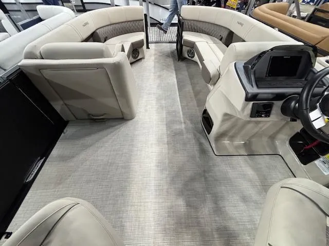 Slide: The Image of 2025 Harris SUNLINER 230 SLDH pontoon boat interior with spacious seating and modern dashboard. - 9