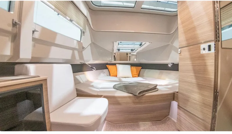 Slide: The Image of 2025 Saxdor 320 GTO cabin interior with modern design and cozy bedding. - 16